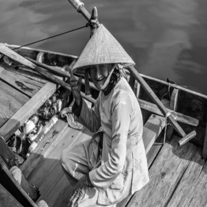 Image by fernandesdn123 titled ’woman, vietnam, boat’. Source: Pixabay