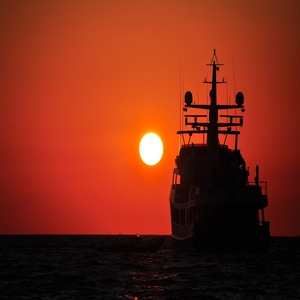 Image by softcodex titled ’sunset, ship, silhouette’. Source: Pixabay
