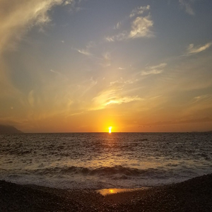 Image by LiseyBC titled ’sunset, ocean, waves’. Source: Pixabay