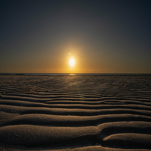 Image by xiSerge titled ’beach, sunrise, sand’. Source: Pixabay Image by xiSerge titled ’beach, sunrise, sand’. Source: Pixabay