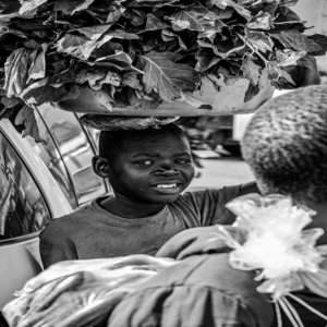 Image by AlvinVisuals titled ’boy, street vendor, portrait’. Source: Pixabay