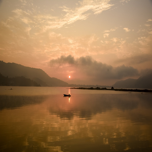 Image by suzalgurungz titled ’lake, boats, sunset’. Source: Pixabay